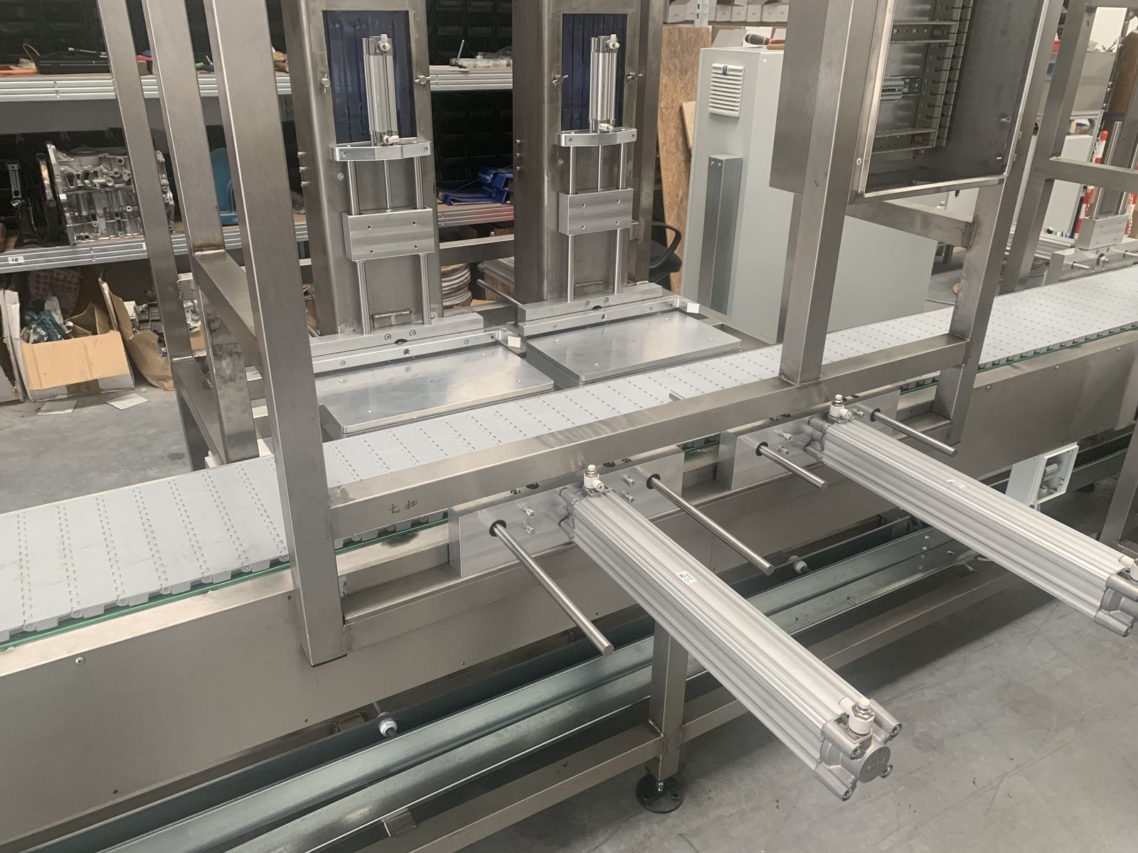 Morgan grinder station detail with pneumatic actuators